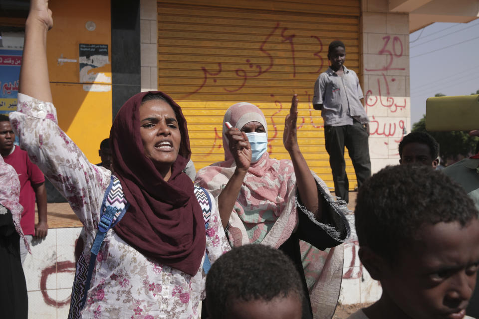 People chant slogans during a protest in Khartoum, amid ongoing demonstrations against a military takeover in Khartoum, Sudan, Thursday, Nov. 4, 2021. (AP Photo/Marwan Ali)