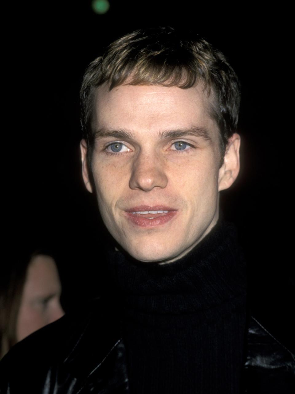 Peter Paige in 2000 in black turtleneck