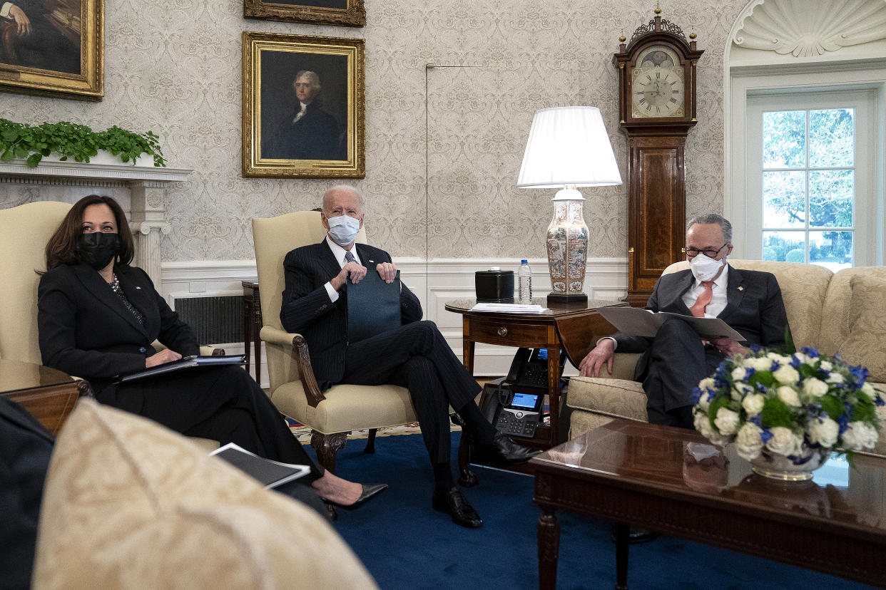 WASHINGTON, DC - FEBRUARY 03: U.S. President Joe Biden (C) and Vice President Kamala Harris meet with Senate Majority Leader Charles Schumer (D-NY) and other Democratic senators to discuss his $1.9 trillion American Rescue Plan in the Oval Office at the White House on February 03, 2021 in Washington, DC. In an effort to generate bipartisan support for his plan, Biden met with Republican senators a day earlier to discuss his COVID-19 relief plan, which Democrats are working to push through Congress with or without the GOP. (Photo by Stefani Reynolds-Pool/Getty Images)