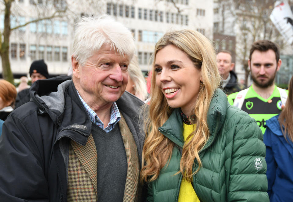 Stanley Johnson introduces himself to Carrie Symonds at an anti-whaling protest outside the Japanese Embassy in central London. (Photo by John Stillwell/PA Images via Getty Images)