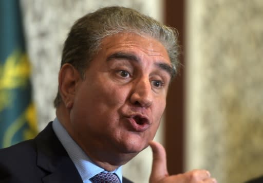 Pakistani Foreign Minister Shah Mehmood Qureshi speaks to reporters in Islamabad about Kashmir