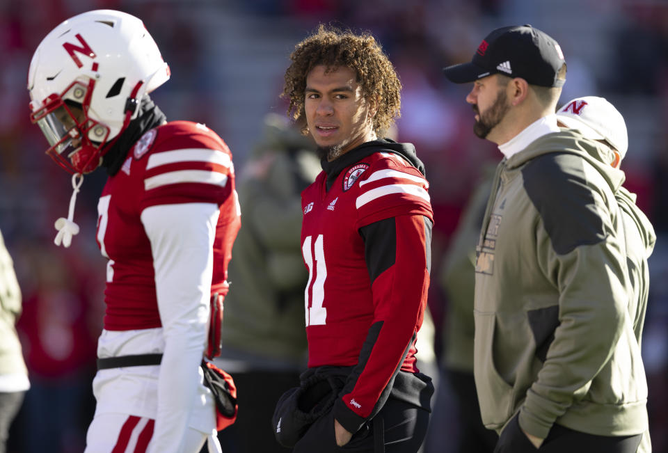 Nebraska quarterback Casey Thompson (11) walks around out of uniform during warmups before an NCAA college football game against Minnesota, Saturday, Nov. 5, 2022, in Lincoln, Neb. Thompson was injured during Nebraska's game against Illinois the previous week. (AP Photo/Rebecca S. Gratz)