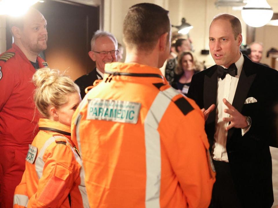 Prince William talks with Air Ambulance Pilots, Doctors and Paramedics as he attends the London Air Ambulance Charity Gala Dinner