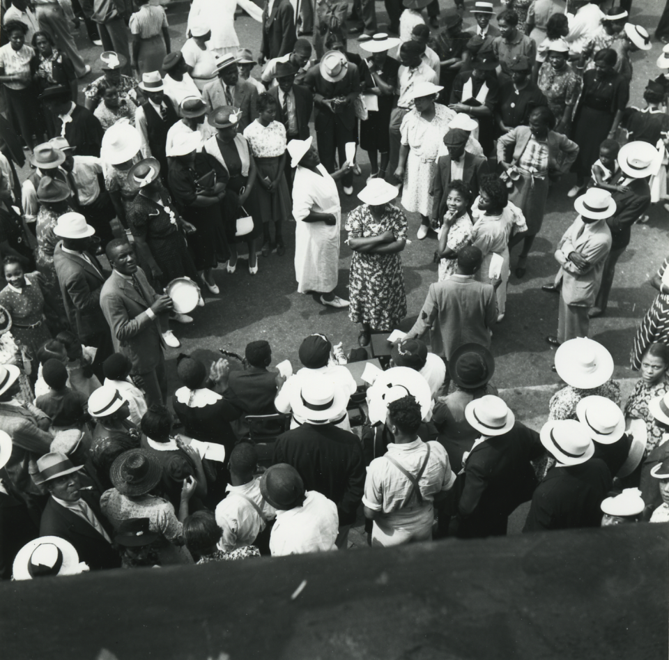 A view of some of the crowds on French Street in Wilmington, Delaware during the Big Quarterly of 1939.