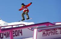 Belgium's Seppe Smits performs a jump during the men's snowboard slopestyle qualifying session at the 2014 Sochi Olympic Games in Rosa Khutor February 6, 2014. REUTERS/Lucas Jackson (RUSSIA - Tags: OLYMPICS SPORT SNOWBOARDING)