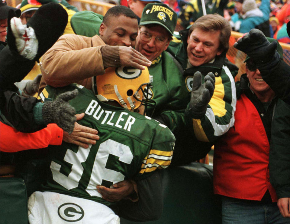 FILE - Green Bay Packers' LeRoy Butler jumps into the crowd following an interception late in the fourth quarter of their game against the Chicago Bears in Green Bay, Wisc., on Nov. 12, 1995. After starring for the Seminoles, Butler helped recast the safety position in the NFL and restore Green Bay's glory days during a 12-year career that featured five All-Pro selections and landed him in the Pro Football Hall of Fame's Class of 2022. (AP Photo/Dan Currier, File)
