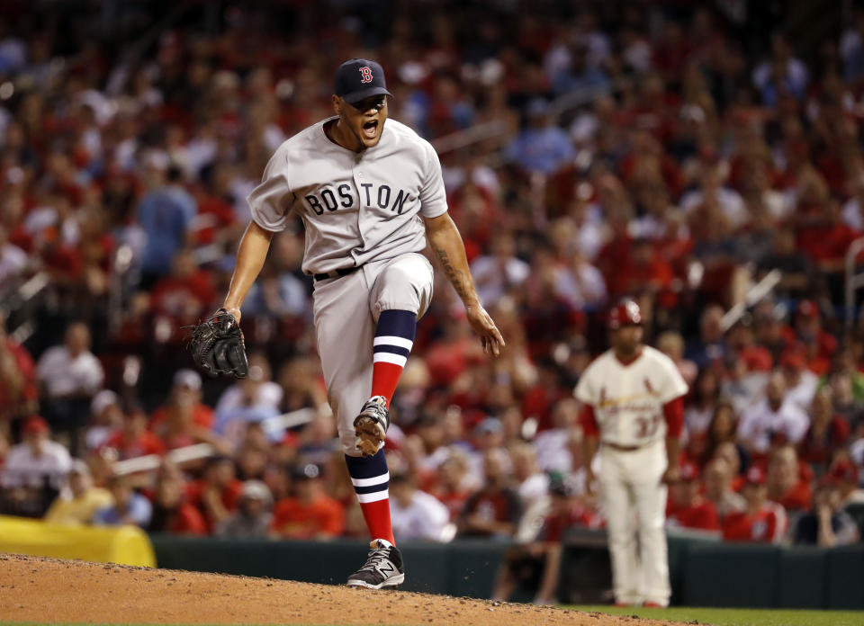 FILE - In this May 16, 2017 file photo, Boston Red Sox starting pitcher Eduardo Rodriguez celebrates after striking out St. Louis Cardinals' Randal Grichuk to end the sixth inning of a baseball game in St. Louis. Rodriguez helped buy plane tickets for a young Venezuelan team to compete in a tournament in Mexico. "I know how it is," he said. "When I was a kid, I had a lot of invitations to play in some competitions, but I didn't have the money to go there so I know how it feels, so that's why I did it." (AP Photo/Jeff Roberson, File)