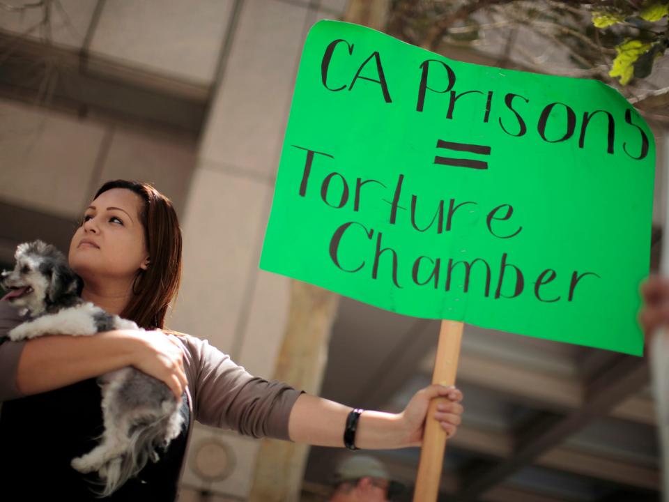 Liz Valencia, 30, attends a rally in Los Angeles, California August 1, 2011, in support of California inmates who spent weeks on a hunger strike to protest the state's prison conditions.