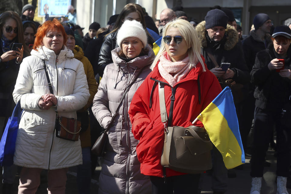 People attend a rally against the Russian occupation in Kherson, Ukraine, Sunday, March 13, 2022. Ever since Russian forces took the southern Ukrainian city of Kherson in early March, residents sensed the occupiers had a special plan for their town. Now, amid a crescendo of warnings from Ukraine that Russia plans to stage a sham referendum to transform the territory into a pro-Moscow "people's republic," it appears locals guessed right. (AP Photo/Petros Giannakouris)