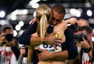 <p>Brianne Theisen Eaton of Canada is congratulated by her husband Ashton Eaton of the United States on winning the gold medal after the Women’s Pentathlon 800 Metres during day two of the IAAF World Indoor Championships at Oregon Convention Center on March 18, 2016 in Portland, Oregon. (Photo by Christian Petersen/Getty Images for IAAF) </p>