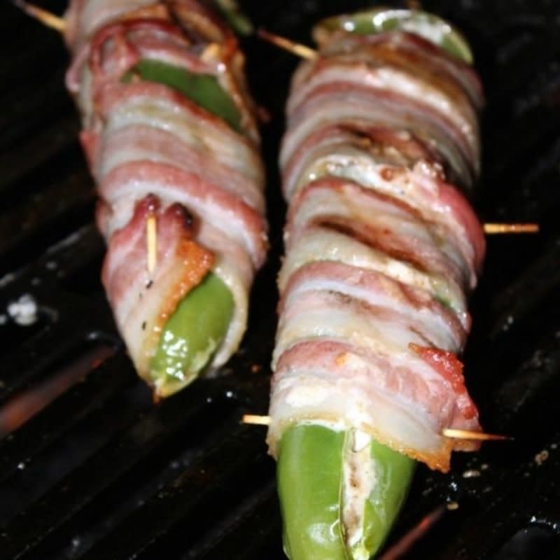 <p>Cook Eat GO</p><p>These bacon-wrapped Anaheim peppers are perfect to grill up for a bbq get-together! Full of flavor but not too spicy! </p><p><strong>Get the recipe:</strong><strong> <a href="https://parade.com/53764/donnaelick/southwestern-grilled-bacon-wrapped-jalapeno-poppers/" rel="nofollow noopener" target="_blank" data-ylk="slk:Bacon Wrapped Stuffed Anaheim Peppers;elm:context_link;itc:0;sec:content-canvas" class="link ">Bacon Wrapped Stuffed Anaheim Peppers</a></strong></p>