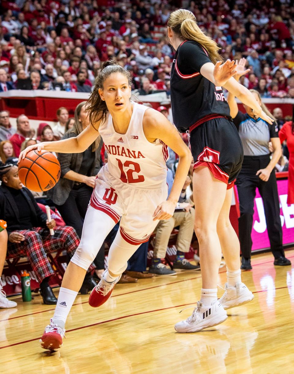 Indiana's Yarden Garzon (12) drives during the first half of the Indiana versus Nebraska women's basketball game at Simon Skjodt Assembly Hall on Sunday, Jan. 1, 2023.