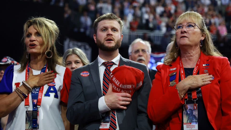 Delegates from Nebraska stand for the National Anthem on the first day of the Republican National Convention at the Fiserv Forum in Milwaukee, Wisconsin on July 15, 2024. - Joe Raedle/Getty Images/File