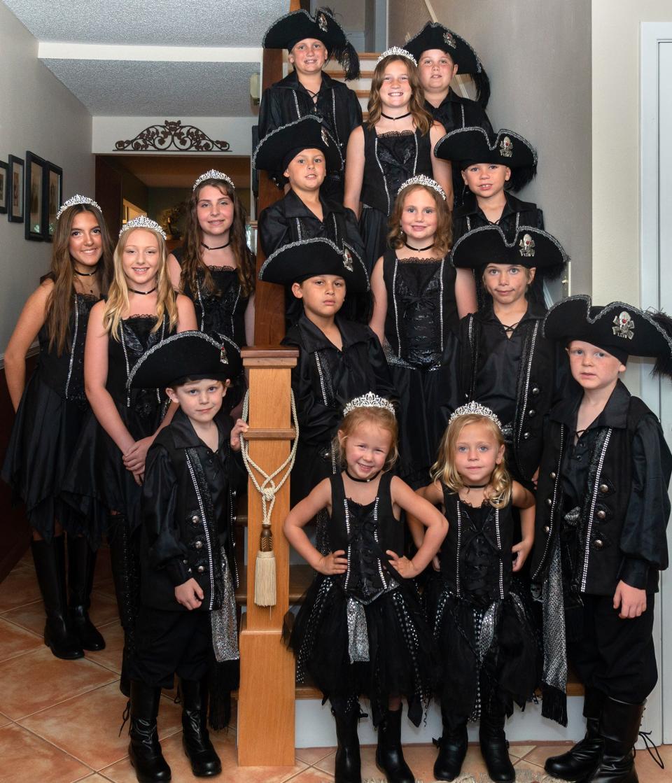 Standing left of stairwell: (from top left) Ava Kramer, Ella Needler, Kate Light, and (bottom left) Chandler Foster. Standing on stairwell: (top row from left) Chandler Buckthal, Grey Smith, Miles Magee, (second row from left) Braden Costabile, Sadie Buckthal, Harrison Gosnell, (third row from left) Parker Kokis, Finn Harrison, (bottom row from left) Hadley McGee, Finley Schweikert and James King.