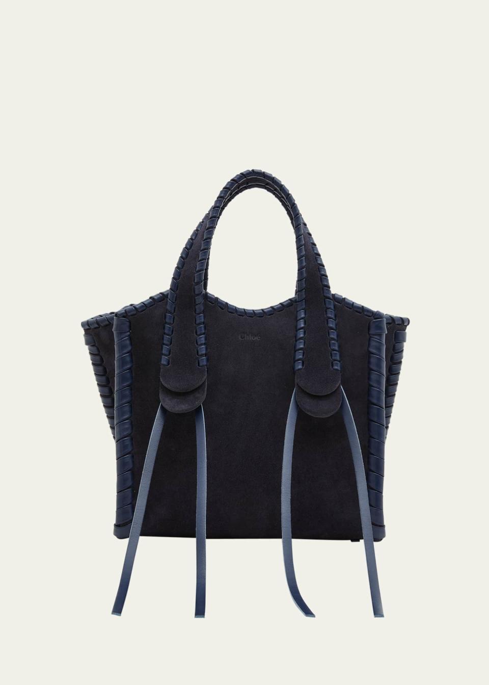 <p><a href="https://go.redirectingat.com?id=74968X1596630&url=https%3A%2F%2Fwww.bergdorfgoodman.com%2Fp%2Fchloe-monty-small-suede-tote-bag-prod183380054&sref=https%3A%2F%2Fwww.harpersbazaar.com%2Ffashion%2Ftrends%2Fg60129629%2Fbest-small-tote-bags%2F" rel="nofollow noopener" target="_blank" data-ylk="slk:Shop Now;elm:context_link;itc:0;sec:content-canvas" class="link ">Shop Now</a></p><p>Monty Small Suede Tote Bag</p><p>bergdorfgoodman.com</p><p>$2490.00</p><span class="copyright">bergdorfgoodman.com</span>