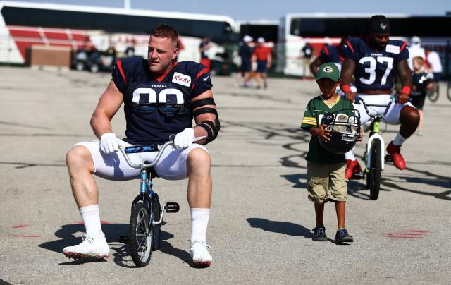 Wisconsin native J.J. Watt breaks bike taking part in 'Dream Drive' before  practice with Packers