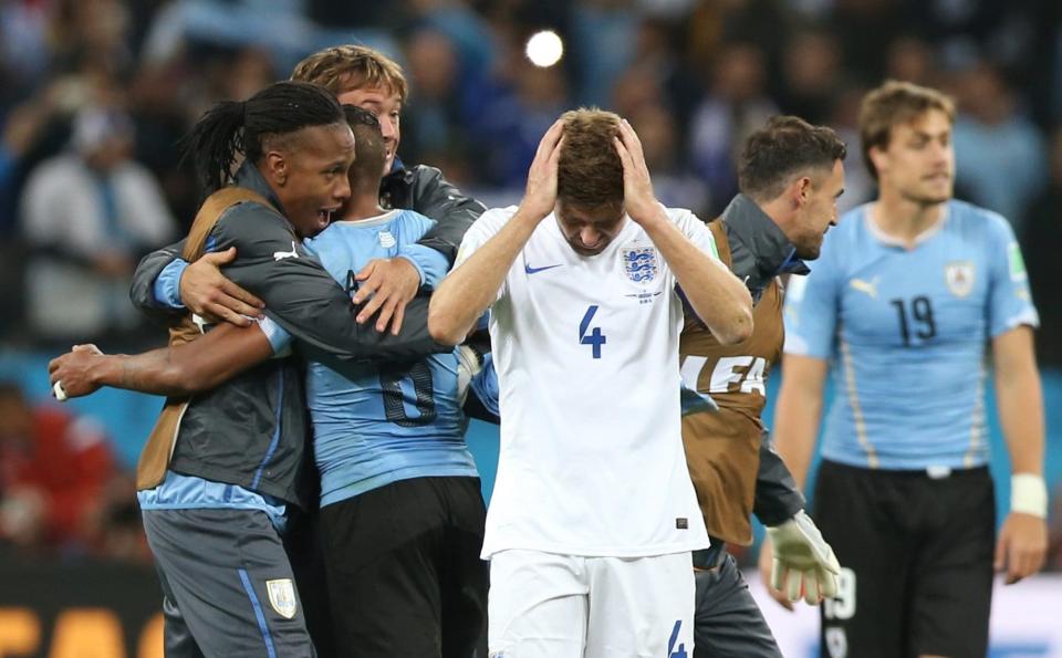 Steven Gerrard looks dejected after defeat to Uruguay at the 2014 World Cup. - Action Images / Lee Smith