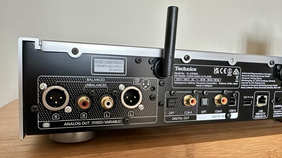 Technics SL-G700M2 on a table, showing the rear of the product