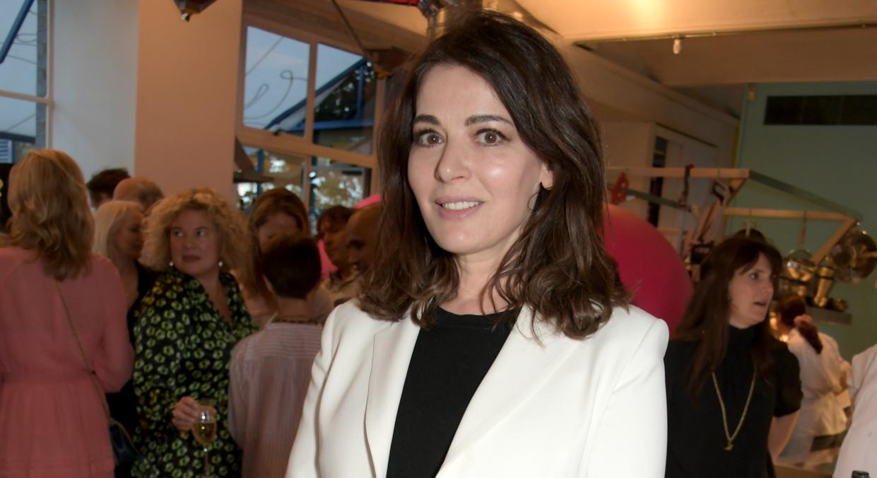 Nigella Lawson says she tries to spend six hours a day reading books on the weekends [Image: Getty]