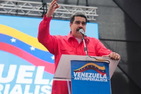 Venezuela's President Nicolas Maduro addresses supporters during a rally in Caracas, Venezuela April 14, 2018. Miraflores Palace/Handout via REUTERS