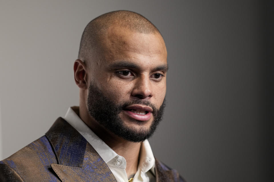 FILE - Dallas Cowboys quarterback Dak Prescott speaks to reporters following an NFL football game against the Philadelphia Eagles, Sunday, Dec. 10, 2023, in Arlington, Texas. Dad Prescott is a finalist for The Associated Press 2023 NFL Most Valuable Player and Offensive Player of the Year awards. The winners will be announced at NFL Honors on Feb. 8. (AP Photo/Sam Hodde, File)