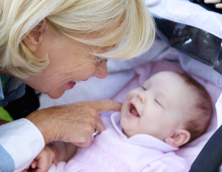 <span class="caption">Babies can bond with many people.</span> <span class="attribution"><span class="source">mimagephotography/shutterstock</span></span>