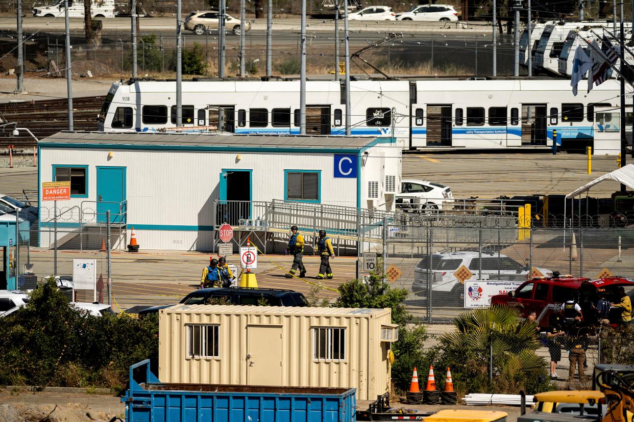 <p>Emergency personnel respond to a shooting at a Santa Clara Valley Transportation Authority (VTA) facility on Wednesday, May 26, 2021, in San Jose, Calif. Santa Clara County sheriff's spokesman said the rail yard shooting left multiple people, including the shooter, dead. </p> ((AP Photo/Noah Berger))