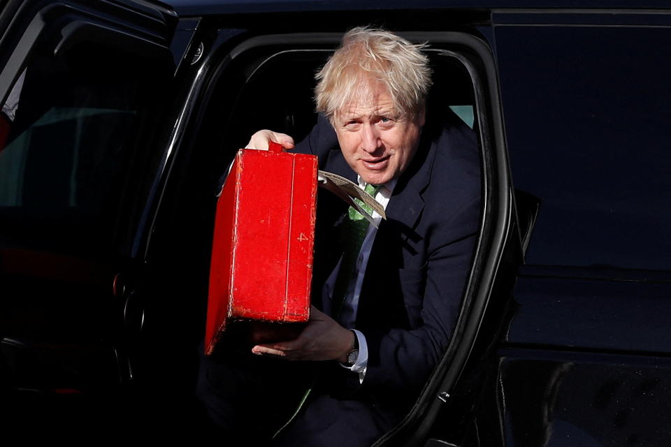 Prime Minister Boris Johnson arrives to board an aircraft in London, for a flight to Kyiv, Ukraine as he holds crisis talks with Ukrainian president Volodymyr Zelensky amid rising tensions with Russia. Picture date: Tuesday February 1, 2022.