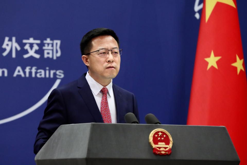 Chinese Foreign Ministry spokesman Zhao Lijian attends a news conference on December 20, 2021 in Beijing, China.
