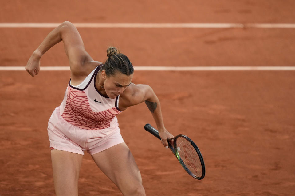 Aryna Sabalenka of Belarus celebrates after winning the first set against Sloane Stephens of the U.S. during their fourth round match of the French Open tennis tournament at the Roland Garros stadium in Paris, Sunday, June 4, 2023. (AP Photo/Thibault Camus)