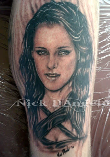 <p>This K-Stew fan had the actress' portrait (looking rather sullen and moody as usual) on their arm.<br><br><a rel="nofollow" href="http://au.launch.yahoo.com/galleries/g/-/9650510/guess-the-awkward-nipple-slip/9611247/" data-ylk="slk:PICS: Guess the Awkward Nipple Slip!;elm:context_link;itc:0;sec:content-canvas" class="link ">PICS: Guess the Awkward Nipple Slip!</a></p>