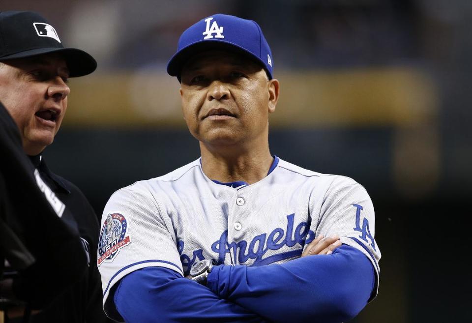 Dodgers manager Dave Roberts is searching for answers to his team’s stunningly slow start. (AP)