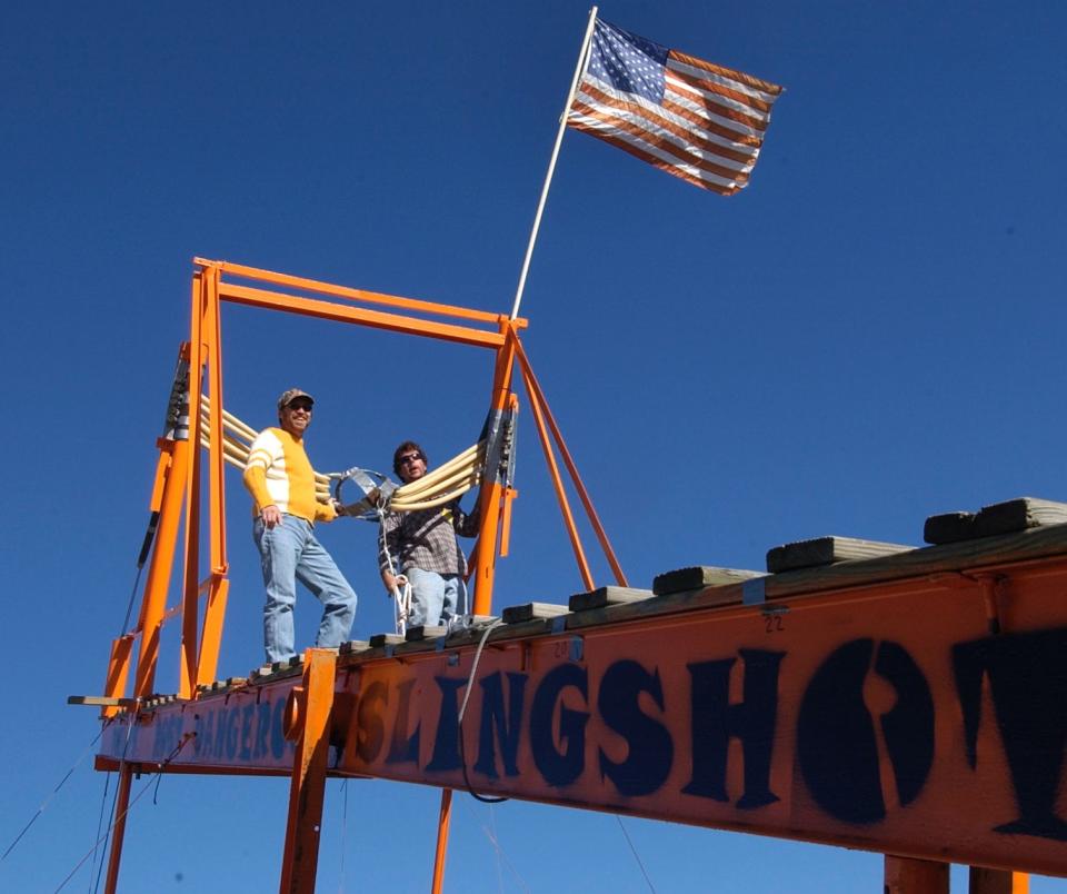 Nov. 6, 2004: Steve Shockley of Frankford (left) and Mark Caldwell of Rehoboth getting ready to take a shot with the World's Most Dangerous Slingshot. Caldwell said this was his 6th year at the annual event.