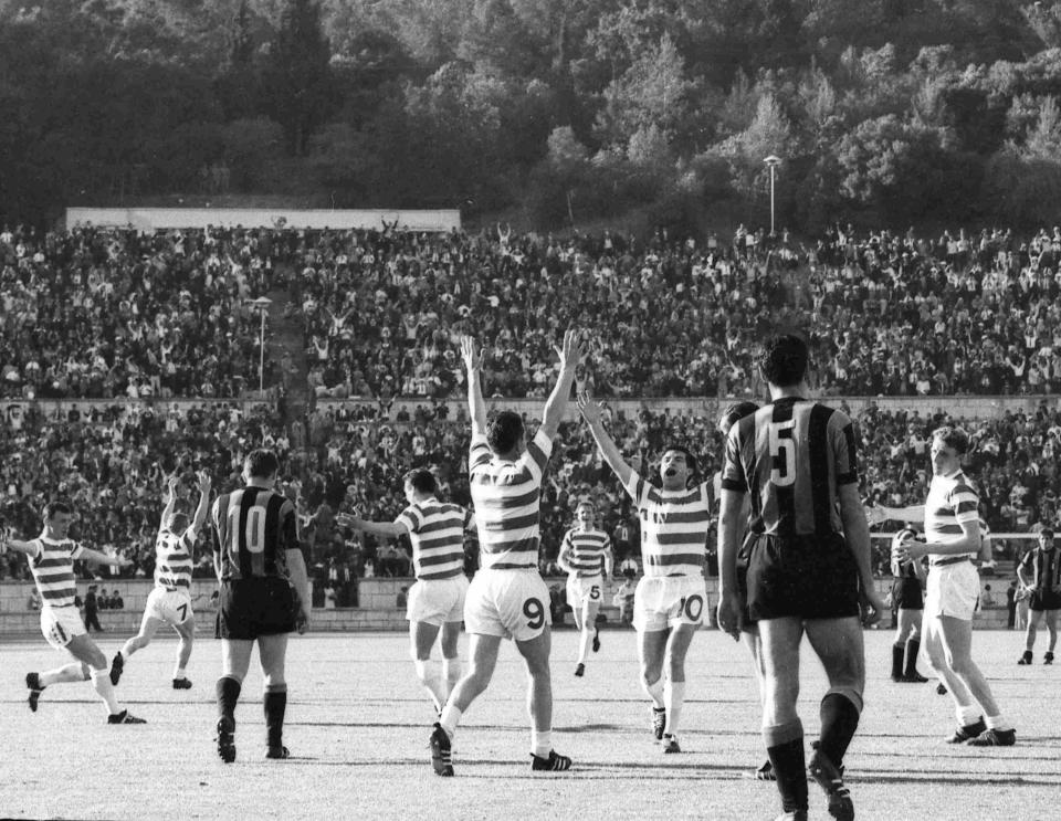 FILE - In this May 25, 1967 file photo players of the Scottish football club Glasgow Celtic throw up their arms in celebration after Stevie Chalmers scored their second goal in the European Cup Final soccer match against Inter Milan, in Lisbon, Portugal. G is for Glasgow Celtic, who became the first British team to win the trophy when they beat Italian giants Internzionale 2-1. All of Celtic's players were born within a 30-mile radius of Glasgow. (AP Photo, File)
