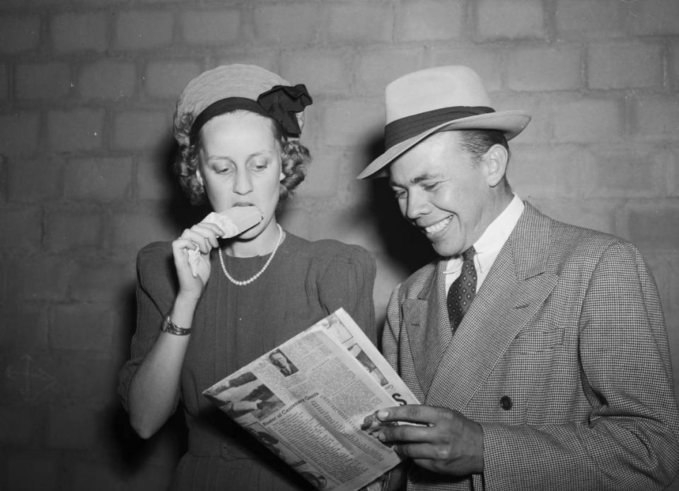 1940: Texas Christian University vs. Centenary College football game. Shown here are Miss Betty Weir and Dan Greenwood during halftime of the football game.