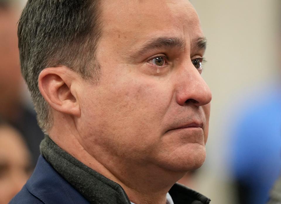 Sen. Roland Gutierrez, D - San Antonio, cries as he listens to U.S. Attorney General Merrick Garland speak at a news conference at the Herby Ham Activity Center in Uvalde on Thursday January 18, 2024, about the Department of Justice Incident Report about the police response to the mass shooting at Robb Elementary School.