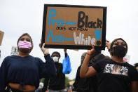 People participate in a Black Lives Matter protest rally in Hyde Park, London, in memory of George Floyd who was killed on May 25 while in police custody in the US city of Minneapolis. (Photo by Victoria Jones/PA Images via Getty Images)