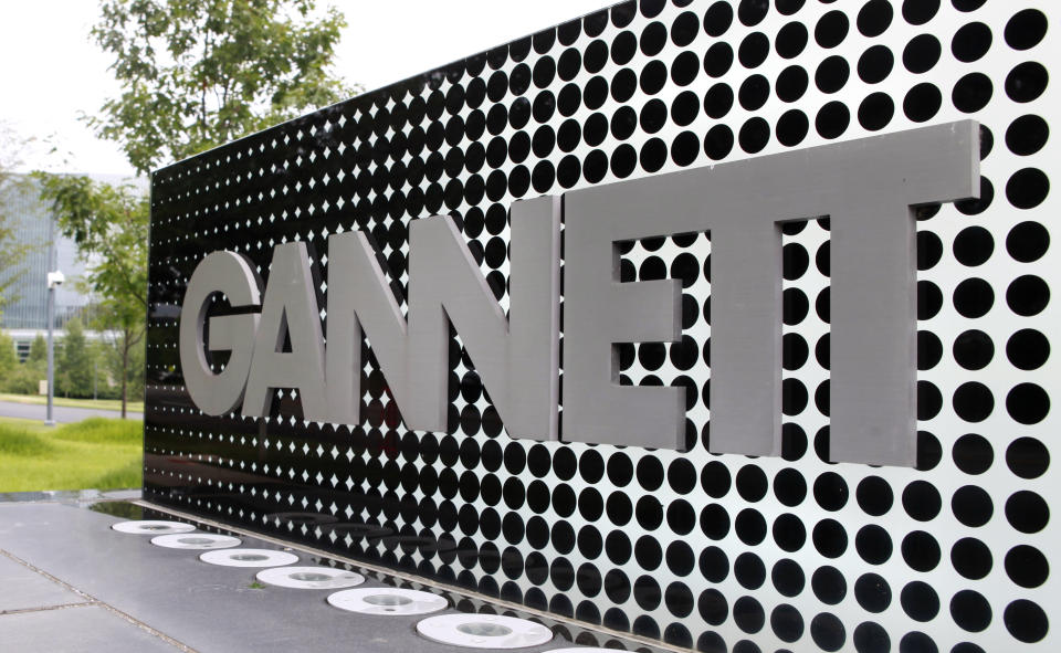 FILE - In this July 14, 2010, file photo, the Gannett Co.headquarters sign stands in McLean, Va. The Wall Street Journal is reporting that MNG Enterprises, better known as Digital First Media, is preparing to bid for newspaper publisher Gannett Co. (AP Photo/Jacquelyn Martin, File)