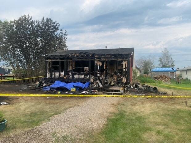 Fire destroyed the home of a Fort Simpson resident last month, and police are asking for the public to help give them closure. (Submitted by Sean Whelly - image credit)