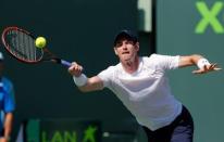 Mar 31, 2015; Key Biscayne, FL, USA; Andy Murray hits a forehand against Kevin Anderson (not pictured) on day nine of the Miami Open at Crandon Park Tennis Center. Mandatory Credit: Geoff Burke-USA TODAY Sports