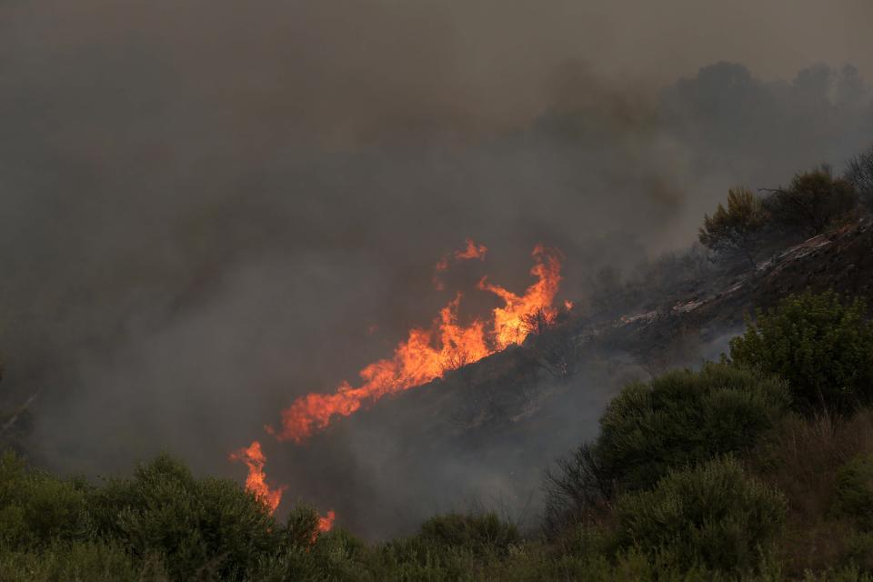 Photo taken on July 24, 2023 shows a wildfire in Bouira Province, Algeria. The death toll from wildfires in northern Algeria has risen to 34, including 10 soldiers, the Interior Ministry said in an update on Monday. (Photo by Xinhua via Getty Images)