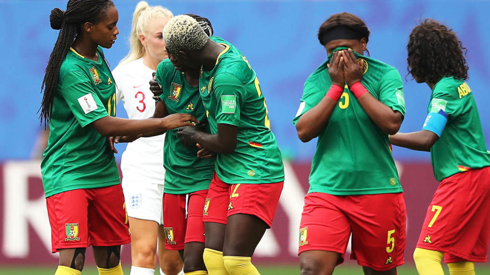 Cameroon players were in tears at one stage against England.  (Photo by Molly Darlington - AMA/Getty Images)