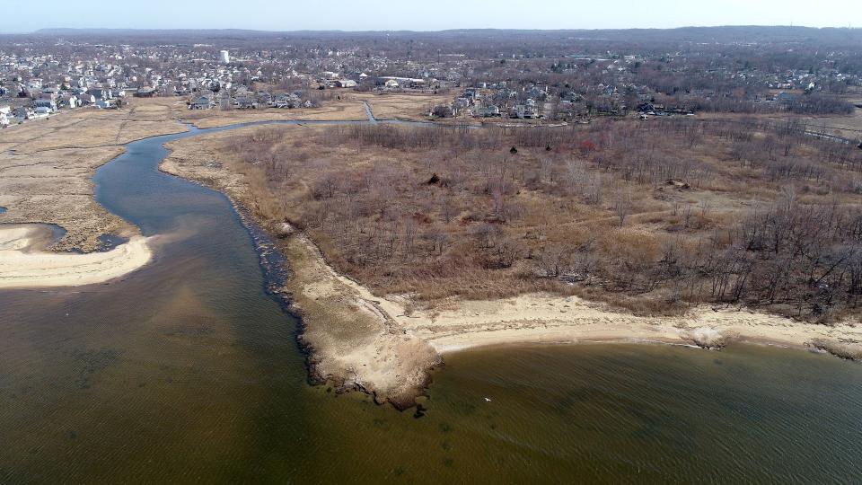 Despite shutting down in 1979 this dumpsite, shown Tuesday, March 23, 2021, along the Keyport bayshore near the Aeromarine Industrial Park was never properly capped.   A lawsuit filed against the property owner claims waste is leaching into the ground and also getting into Raritan Bay.