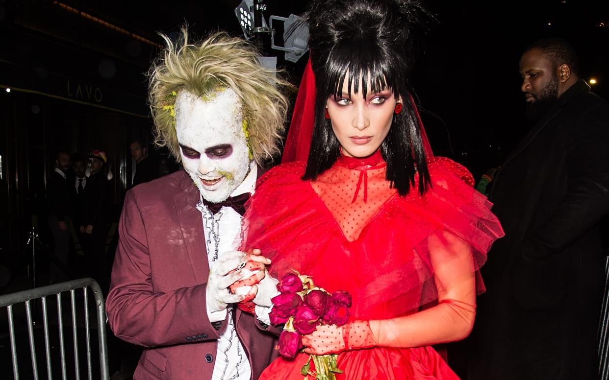 Model Bella Hadid and singer The Weeknd in Halloween costumes - Gilbert Carrasquillo/ GettyImages