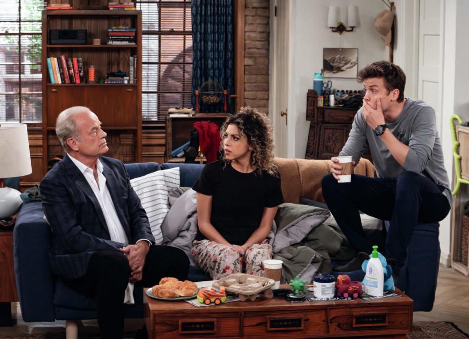 Kelsey Grammer, Jess Salgueiro and Jack Cutmore-Scott on a couch in a still from ‘Frasier’