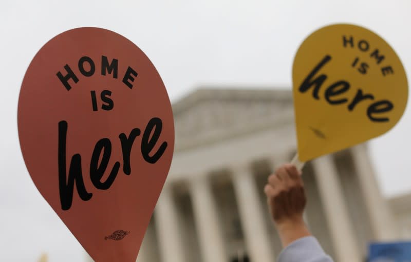 People gather outside the U.S. Supreme Court during oral arguments in Trump administration’s bid to end the DACA program in Washington