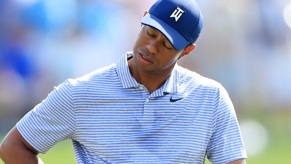 Tiger Woods reacts after a quadruple bogey on the 17th. (Photo by Sam Greenwood/Getty Images)