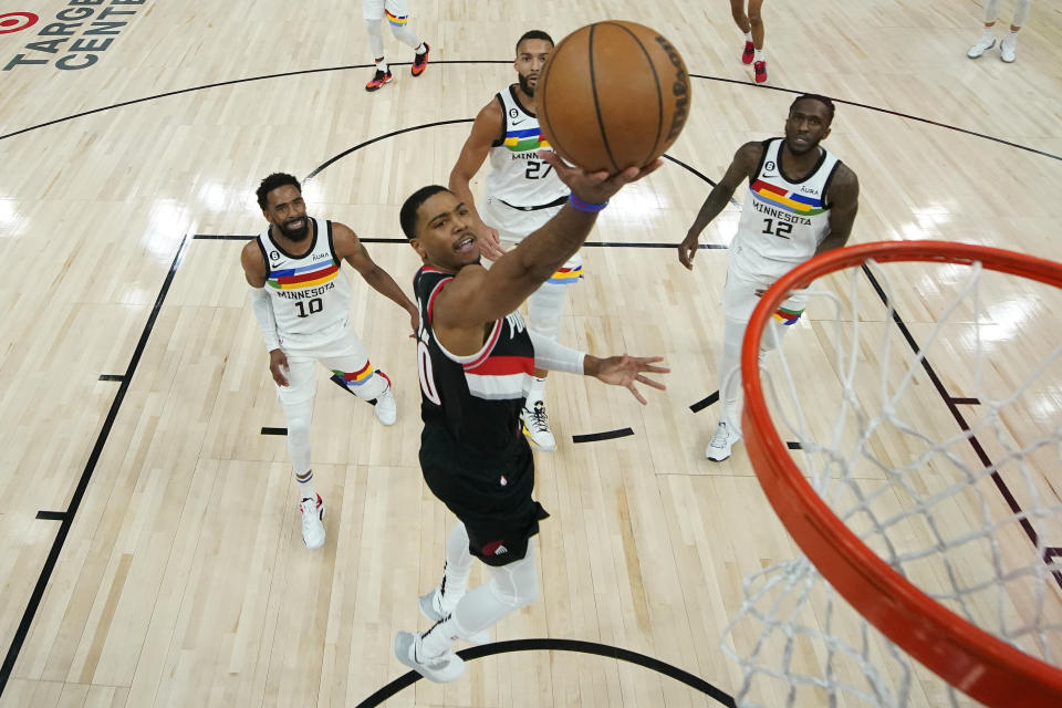 Portland Trail Blazers guard Shaq Harrison goes up for a shot during the first half of an NBA basketball game against the Minnesota Timberwolves, Sunday, April 2, 2023, in Minneapolis. (AP Photo/Abbie Parr)