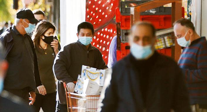 Stock image of Sydney-siders wearing masks in public amid the city's ongoing lockdown. Source: Getty