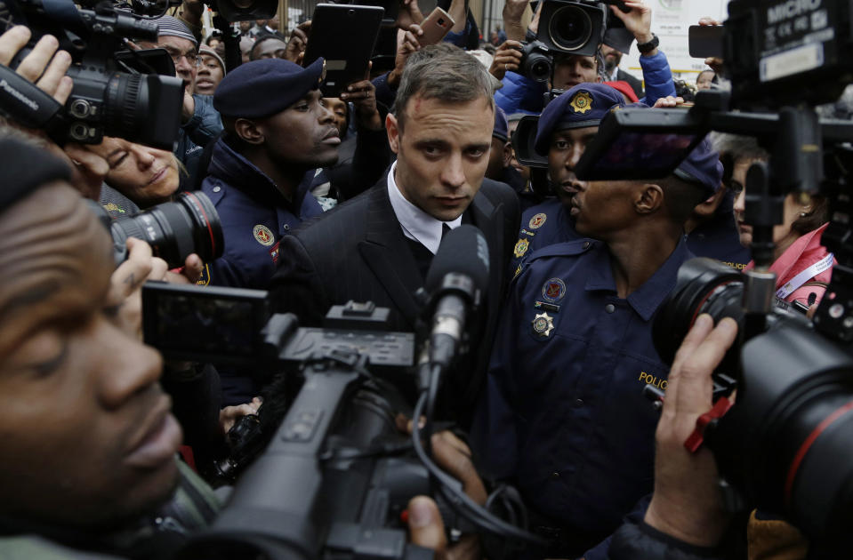 FILE - Oscar Pistorius leaves the High Court in Pretoria, South Africa., Tuesday June 14, 2016 during his trail for the murder of girlfriend Reeva Steenkamp. Eight years after he shot dead his girlfriend, Pistorius is up for parole, but first he must meet with her parents as part of the parole procedure. A parole hearing for Pistorius was scheduled for last month and then canceled, partly because a meeting between Pistorius and Steenkamp's parents, Barry and June, had not been arranged, lawyers for both parties told The Associated Press on Monday, Nov. 8, 2021. (AP Photo/Themba Hadebe, File)